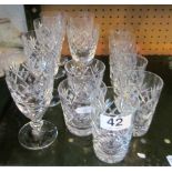 A set of six cut glass wine glasses, six small tumblers and two larger tumblers