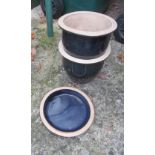 Two blue pots and one saucer