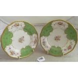 A pair of Coalport hand painted plates green border c 1910