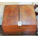 A 19th Century walnut stationery box with envelope action