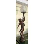 A bronze effect lamp cherub holding a flaming torch converted to electricity