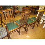 Four 1920s oak dining chairs on barleytwist supports