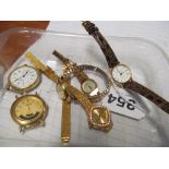 A DKNY watch and other watches