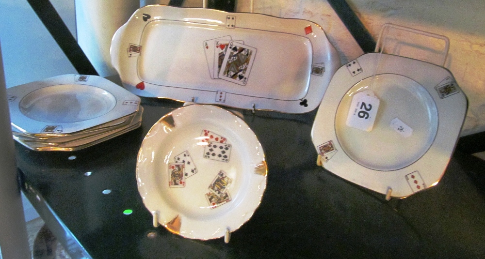 A Carlton ware dish, side plates with playing card design and Limoges card ashtray