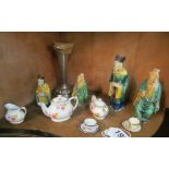 Some miniature teaware, five oriental figures and a spill vase