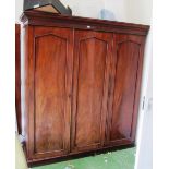 A Victorian mahogany triple wardrobe