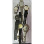 Seven wristwatches