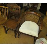 A beech chair with cane back and an oak chair