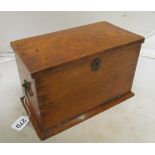 An oak fold out writing box