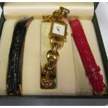 A Gucci vintage ladies watch with three interchangeable straps boxed