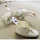 Two Lladro geese, a shoe match striker and two pink cups and saucers (a/f)