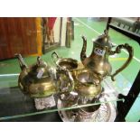 A silver-plate teapot, sugar, jug and pot