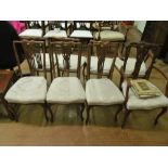 A set of eight Edwardian mahogany chairs (two elbow and six standard)