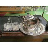 A toastrack, plated stand with glass jug and bowl and plated teaset