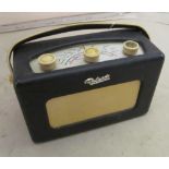 A vintage Roberts R200 radio in blue on swivel base