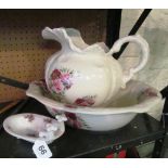 A rose pattern jug and basin and a bath soap dish