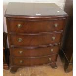 A small bowfront chest of four drawers