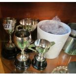 A silver cup, plated cup, glass etc