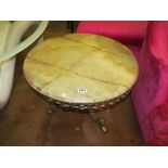 An onyx top circular table