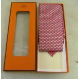 A Hermes tie (boxed)