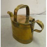 A 19th Century brass watering can, Joseph Sanky jug and oval dish