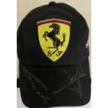 FORMULA ONE: An official souvenir Scuderia Ferrari black baseball-style cap,