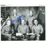 ASTRONAUTS: A good small selection of three NASA signed 8 x 10 photographs by four American NASA