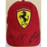FORMULA ONE: An official souvenir Scuderia Ferrari red baseball-style cap,