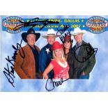 DALLAS: A good colour multiple signed 12 x 8 photograph,