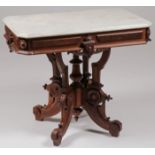 A VICTORIAN WALNUT PARLOR TABLE