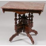 A VICTORIAN WALNUT PARLOR TABLE