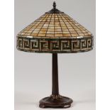 A TIFFANY STYLE LEADED GLASS LAMP