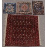 FOUR ORIENTAL RUG/WEAVINGS CIRCA 1920