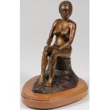 A BRONZE NUDE FEMALE SCULPTURE