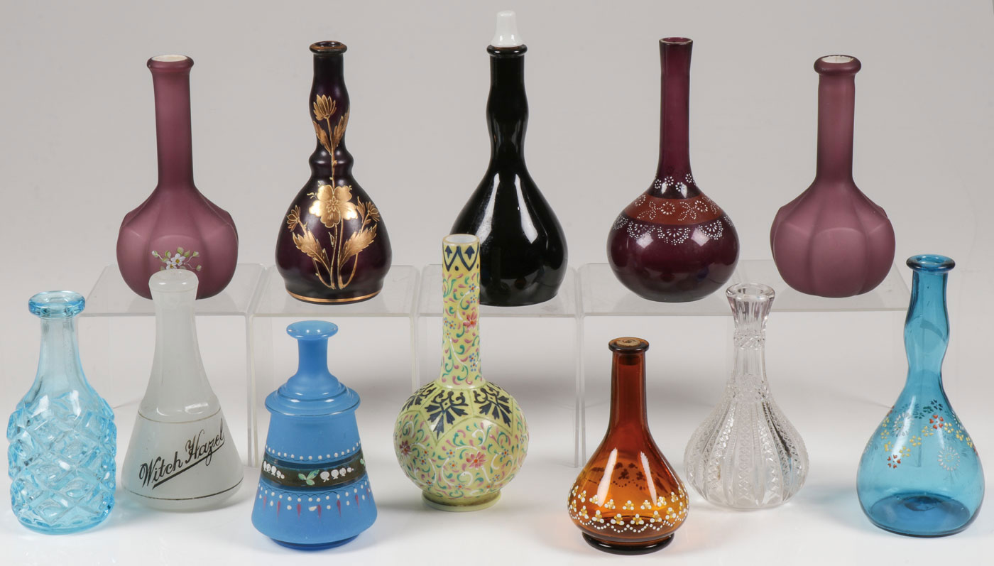 12 ART GLASS BARBER BOTTLES, C. 1890