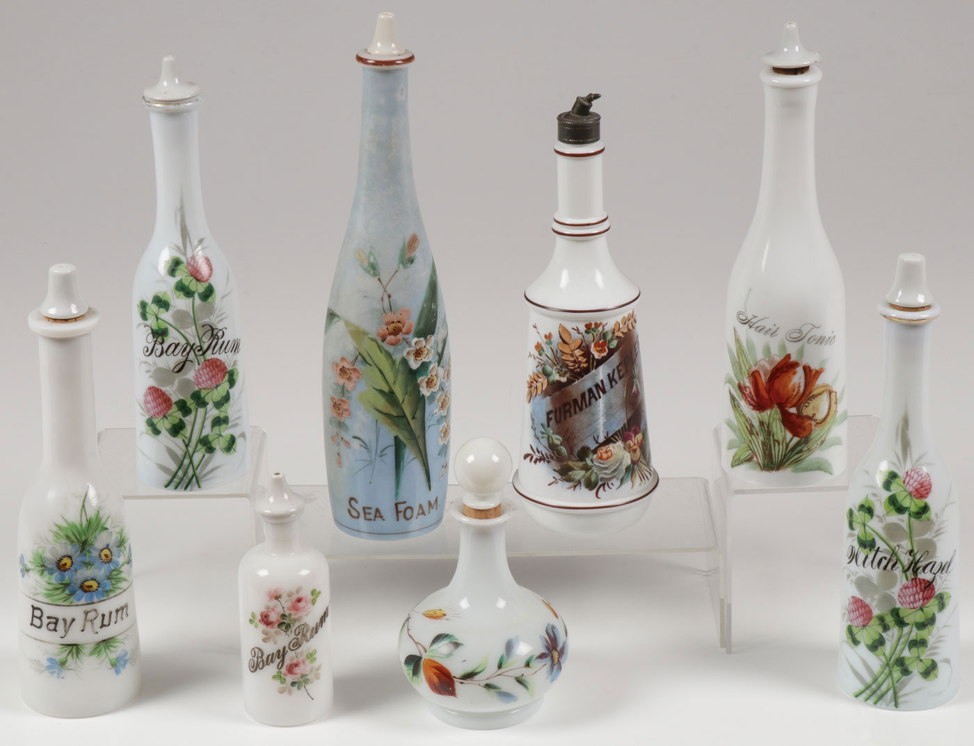 EIGHT PAINTED BARBER BOTTLES, C. 1890