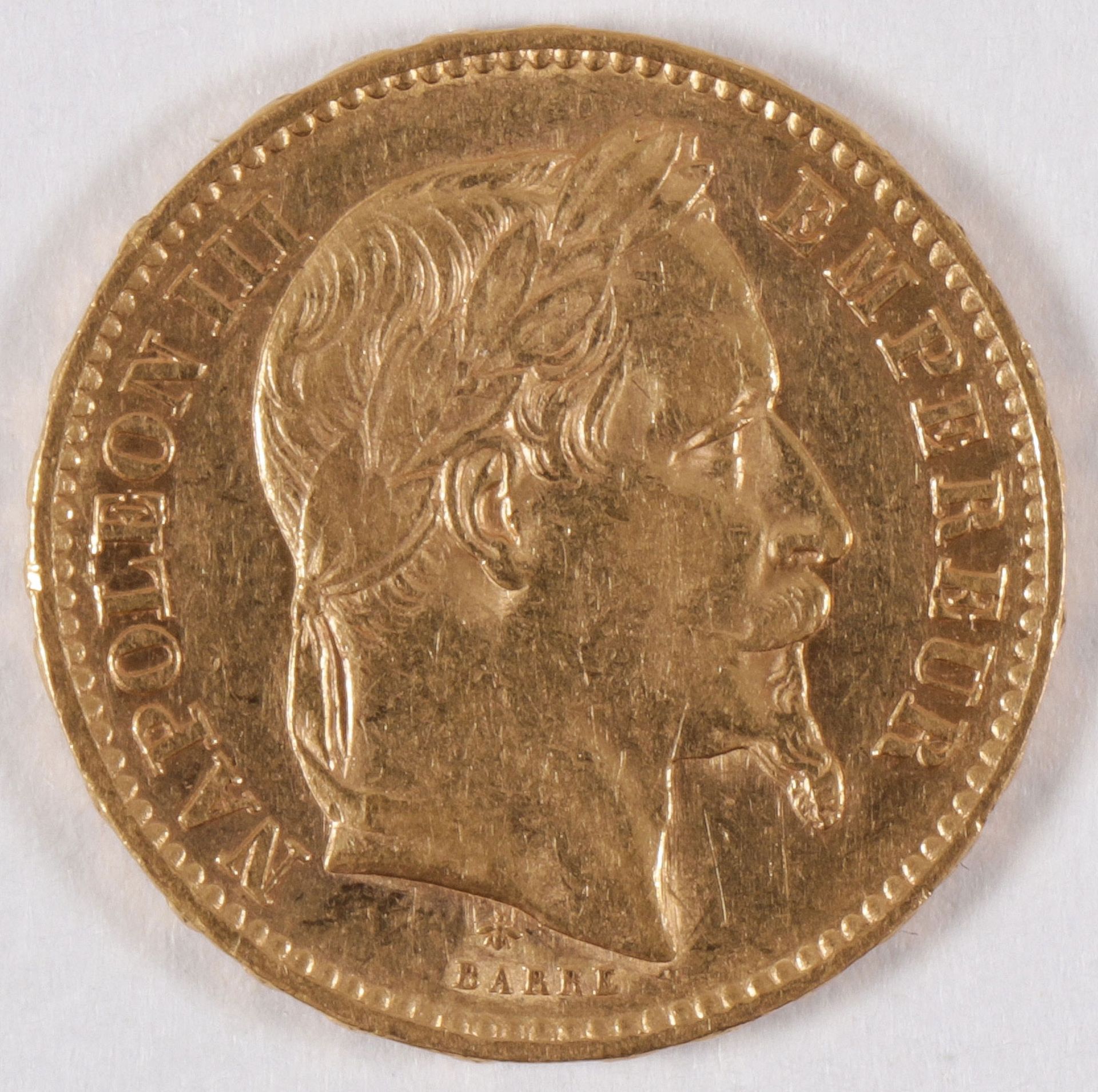 AN 1867 TWENTY FRANCS GOLD COIN