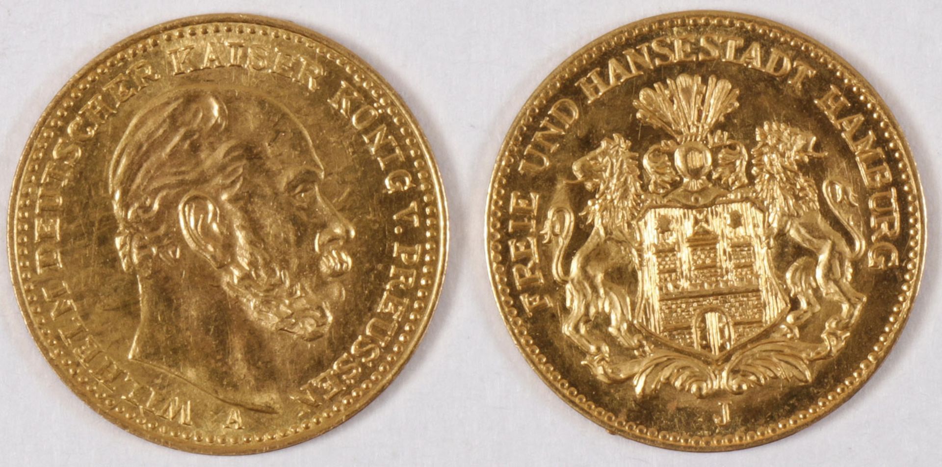 A PAIR OF GOLD COINS