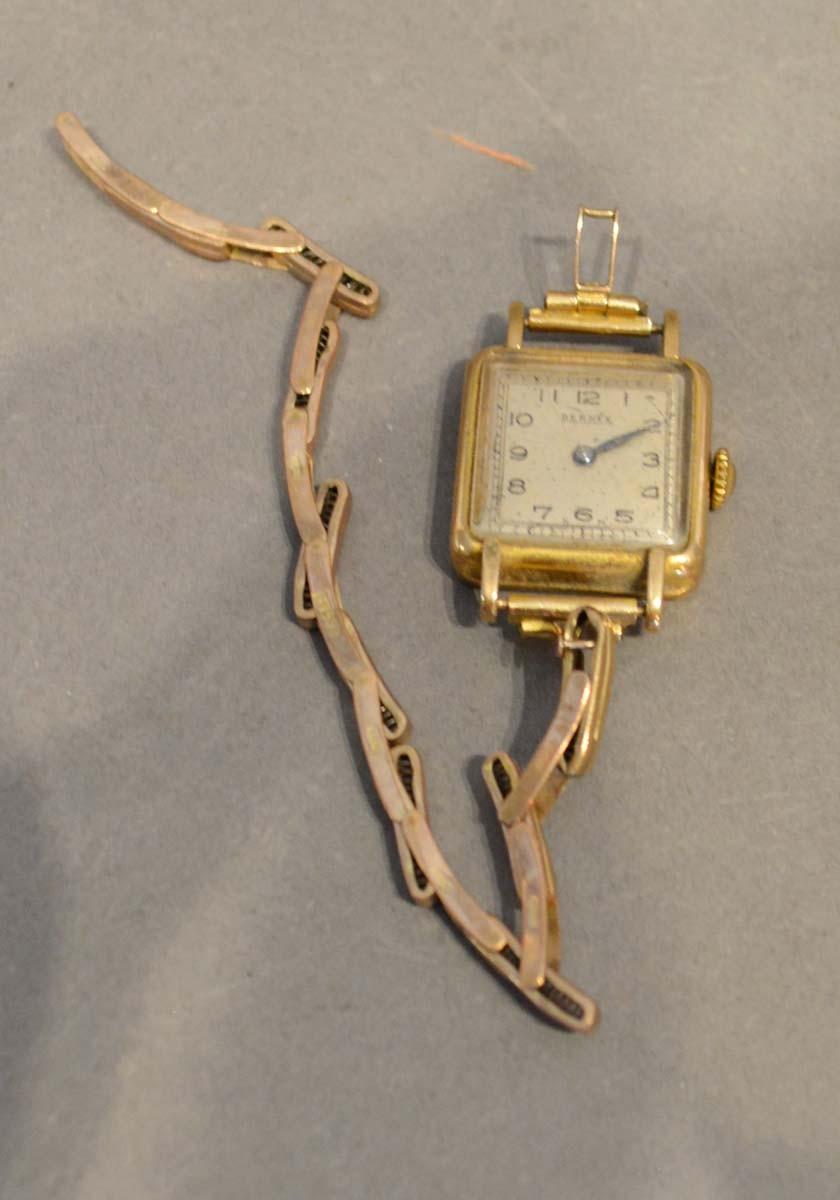 A Bernex 9 Carat Gold Cased Ladies Wristwatch with 9 carat gold strap, 9.4 grammes excluding