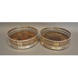 A Pair of George III Silver Bottle Coasters of pierced galleried form (marks rubbed)