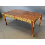 A French Marquetry Inlaid and Gilt Metal Mounted Rectangular Coffee Table, the foliate marquetry
