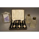A Set of Six London Silver Teaspoons within fitted case, together with a silver photograph frame and