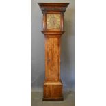 An Oak Longcase Clock, the square hood with half pilasters above a rectangular door, the plinth with