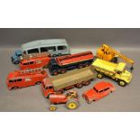 A Dinky Supertoy Foden Regent Tanker, together with a collection of other Dinky toys, all playworn