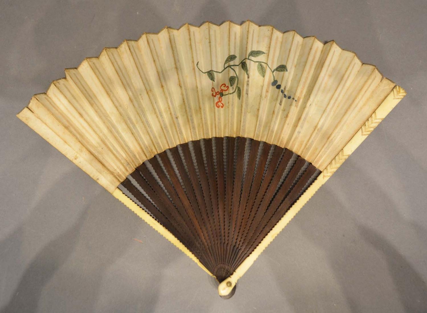 An Early 18th Century German Fan, hand painted with figures within a landscape with shaped wooden - Image 2 of 2