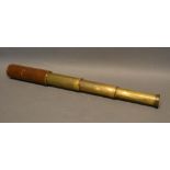 A Brass and Leather Three Draw Telescope by Britannic