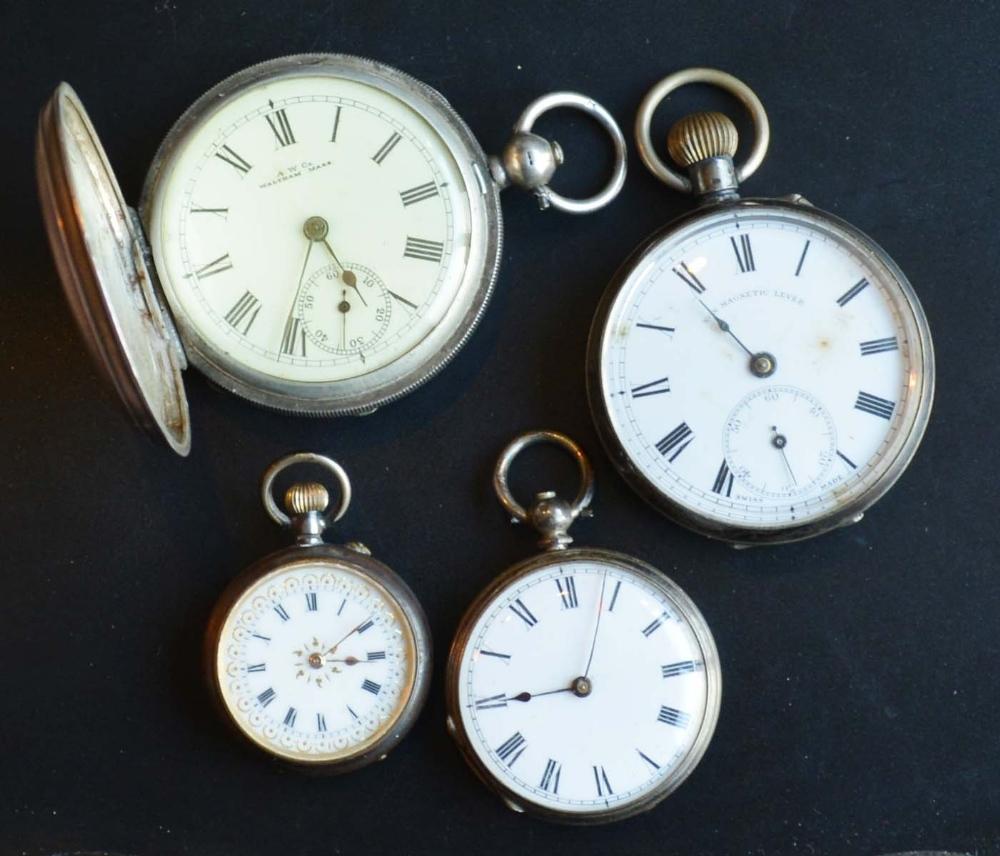 A Silver Cased Full Hunter Pocket Watch by Waltham, together with two other similar silver pocket