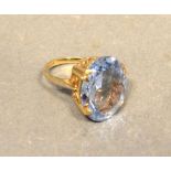 A 9 Carat Gold Dress Ring with large aquamarine style stone