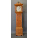 A George III Oak Longcase Clock, the square hood with swan neck pediment and turned pilasters