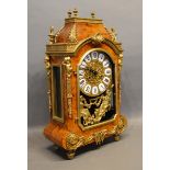 A 20th Century French Walnut Cased and Gilt Metal Mounted Mantel Clock with Roman numerals and two